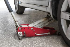 Closeup manual lift jack car lifting vehicle