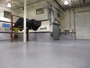 Car mechanic with lift