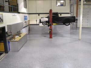 Truck on lift in car shop