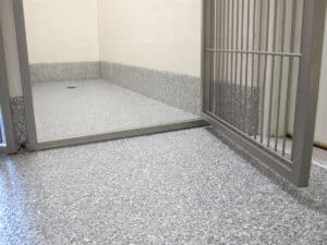 Dog kennel opening with OGI flooring