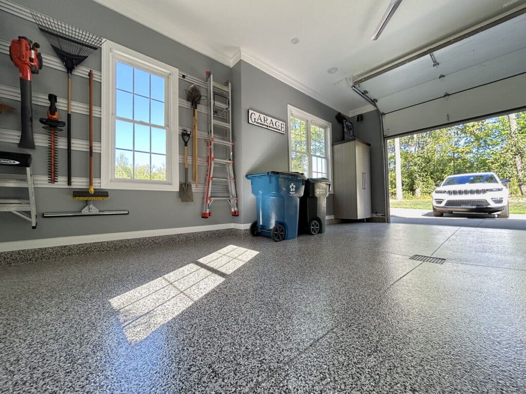 Garage door open with renovated garage