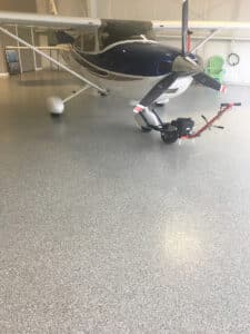 Airplane hangar with airplane