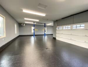 Garage with lift and OGI flooring
